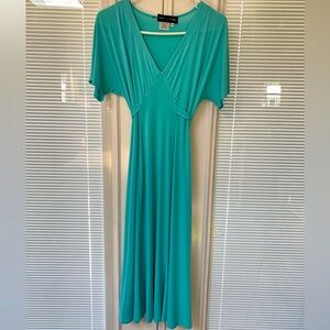 Midi-length dress, perfect for spring/summer. Beautiful turquoise color. Size 12